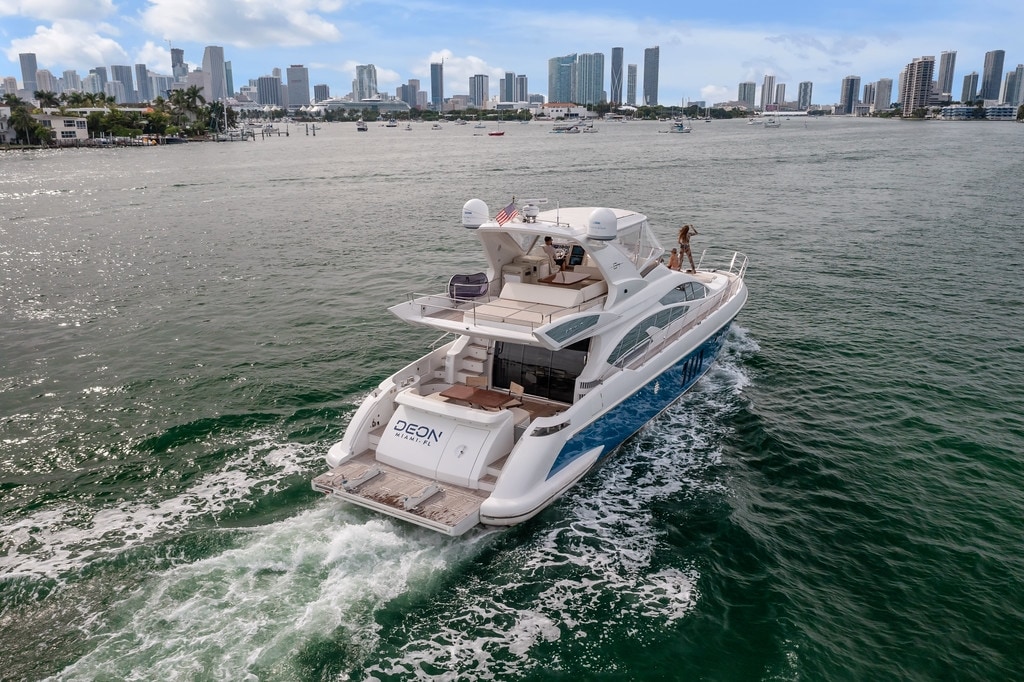 Azimut Deon 64' underway with wake spray and the Miami skyline