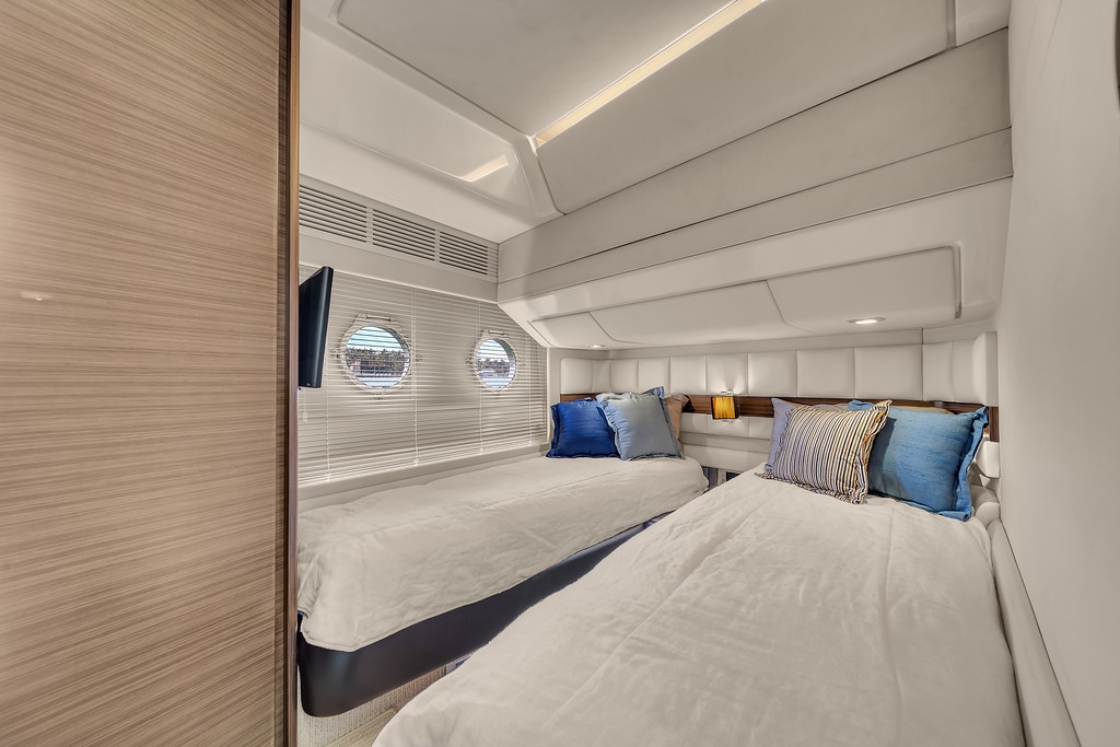 Stateroom aboard the Azimut Deon 64' with a round bed