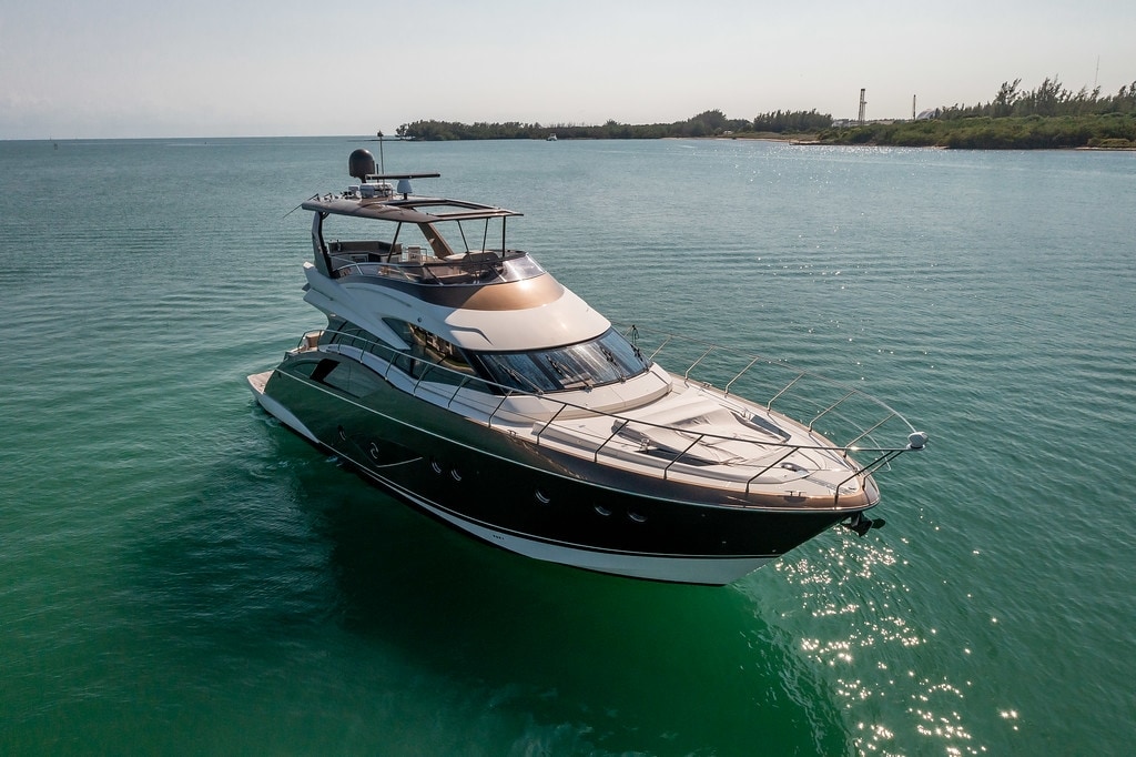 Marquis 66' front quarter view on the water