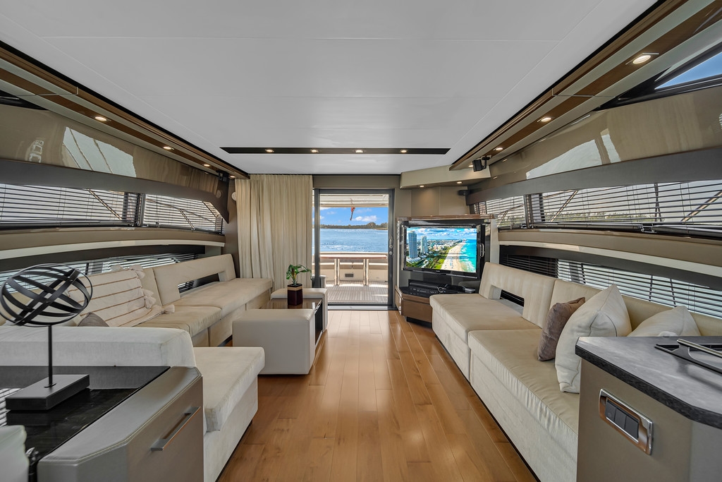 Salon interior of the Marquis 66' with a skyline view
